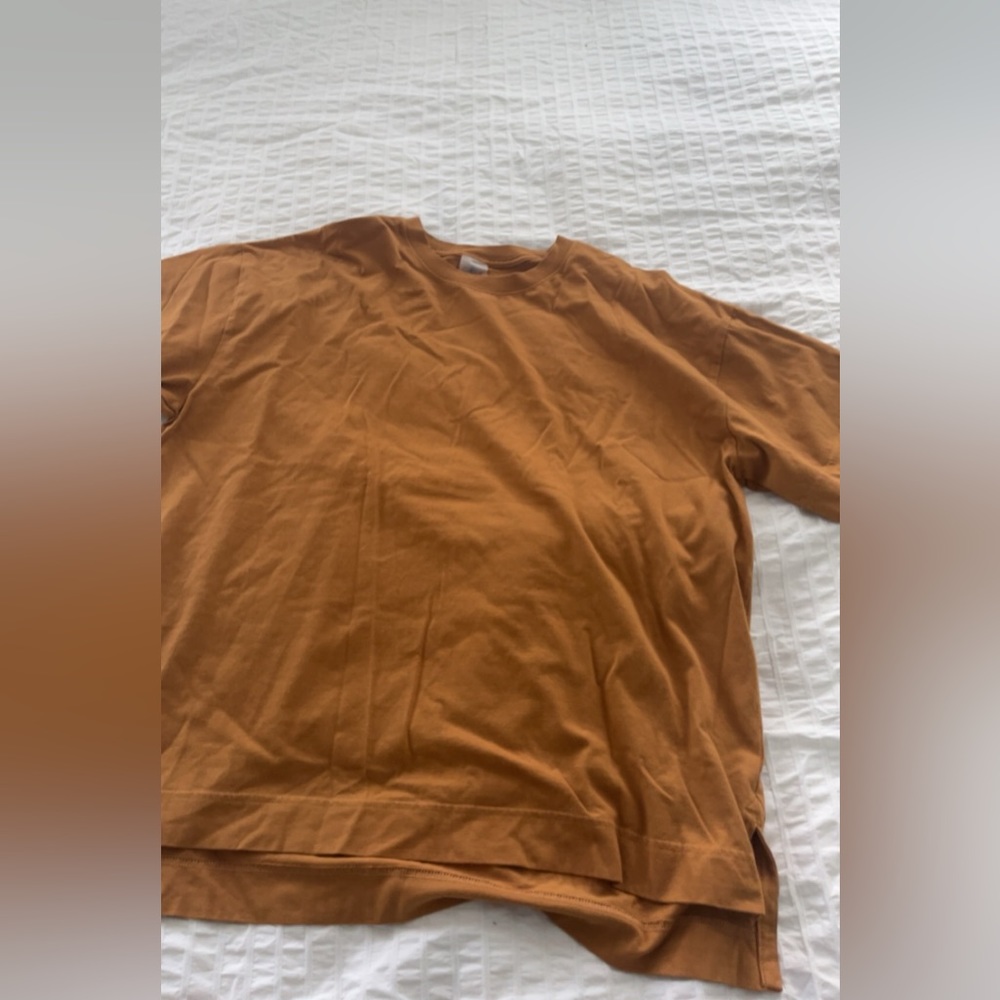 mustard yellow tee shirt